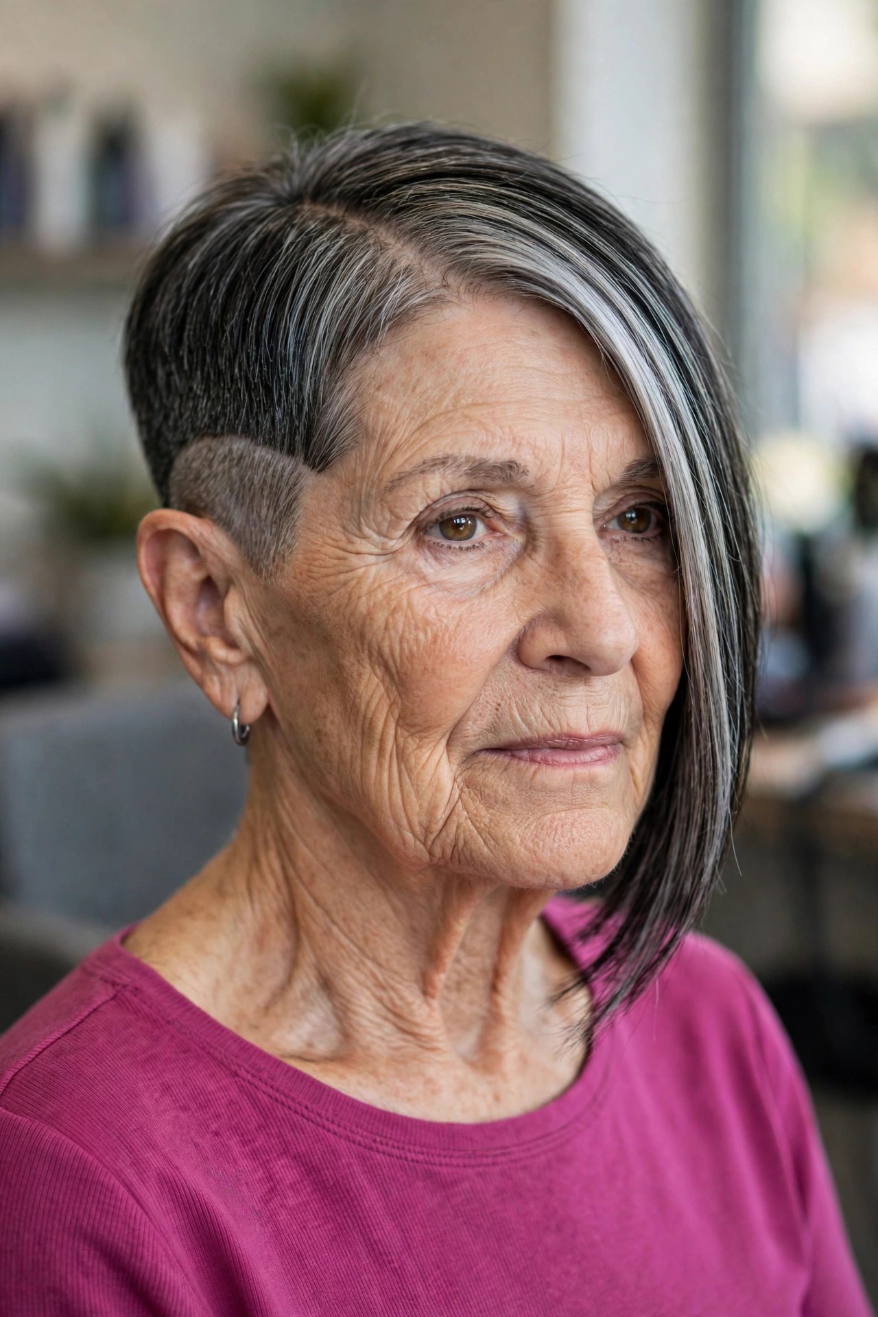 Asymmetrical Bob with a Clipped Side Detail — asymmetrical bob haircut on a woman over 60