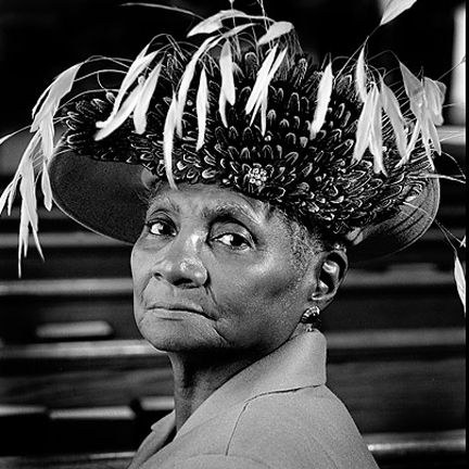 Woman over 70 with feather-Trim Hat with a Calm Crown — church and Sunday hairstyle for women over 70