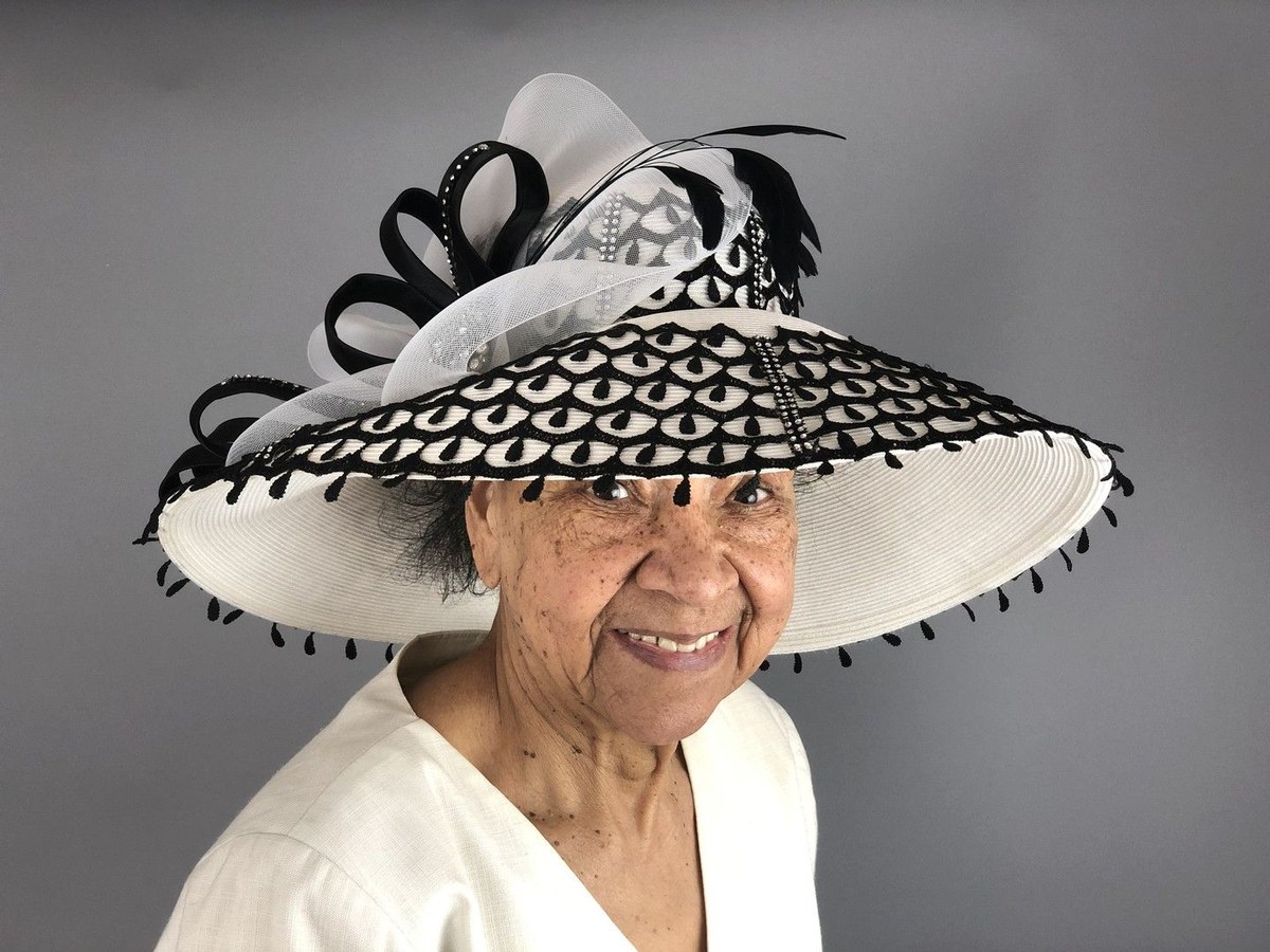 Woman over 70 with patterned Hat Over a Smooth Style — church and Sunday hairstyle for women over 70