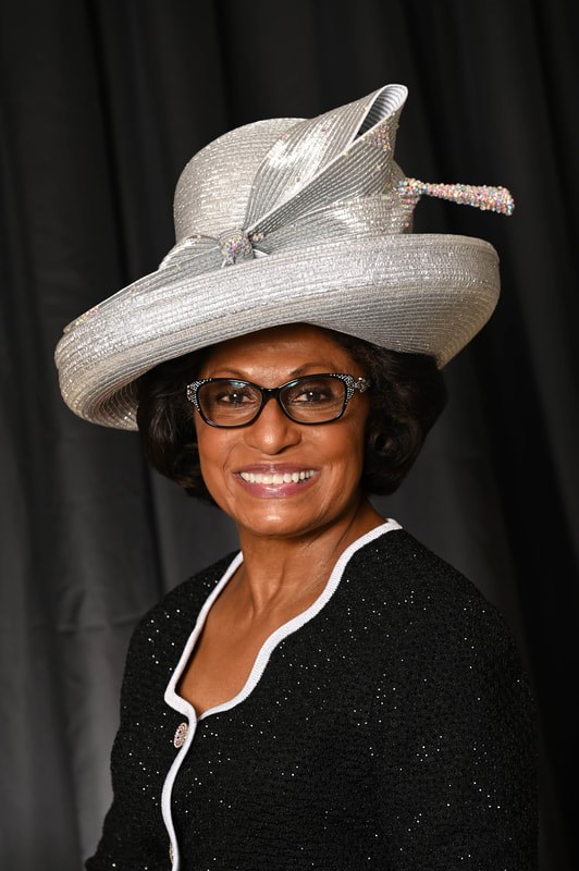 Woman over 70 with silver Hat with a Graceful Bob — church and Sunday hairstyle for women over 70