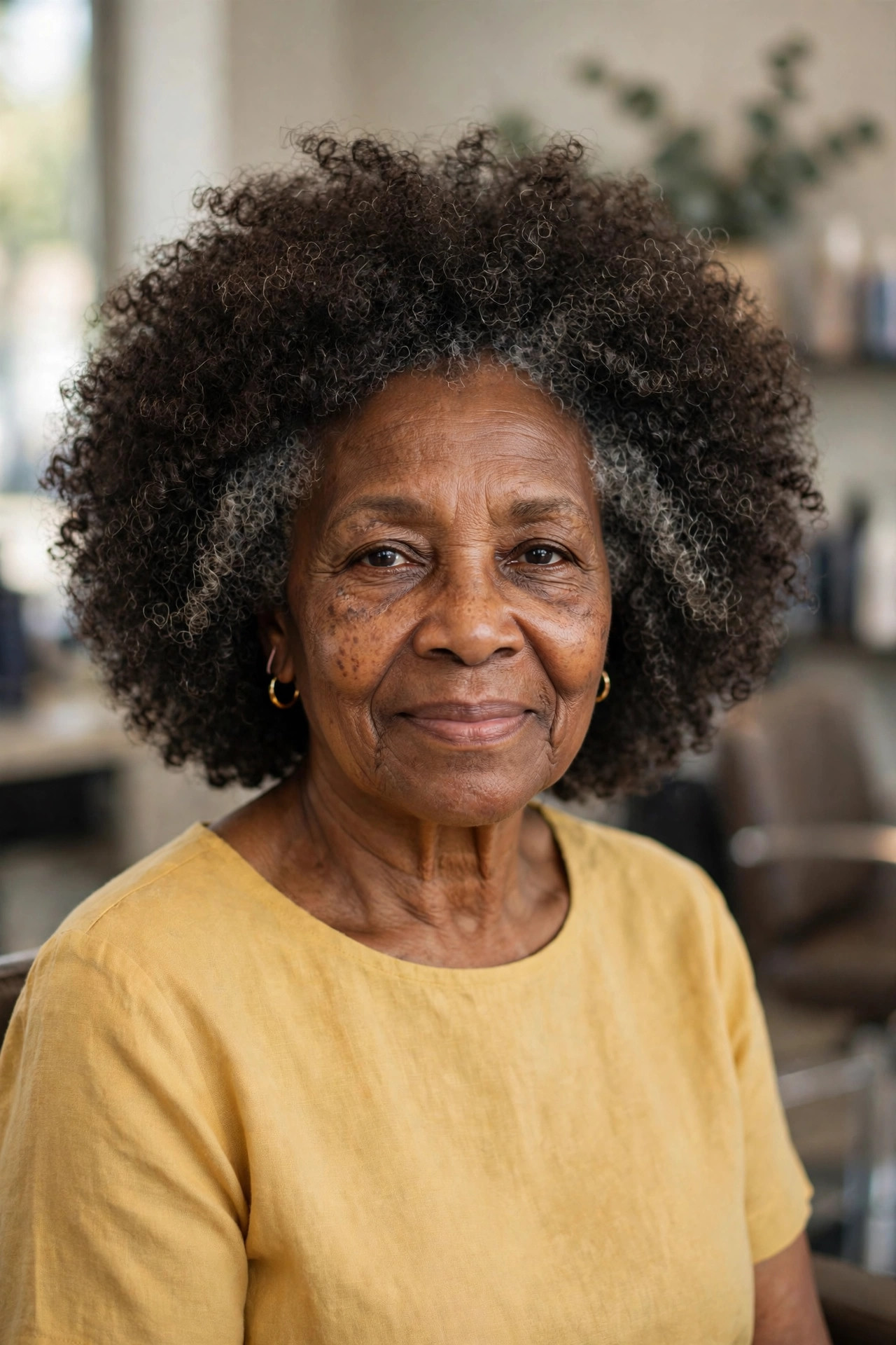 Voluminous Rounded Halo Curls - curly hairstyle for a woman over 60 with natural bounce