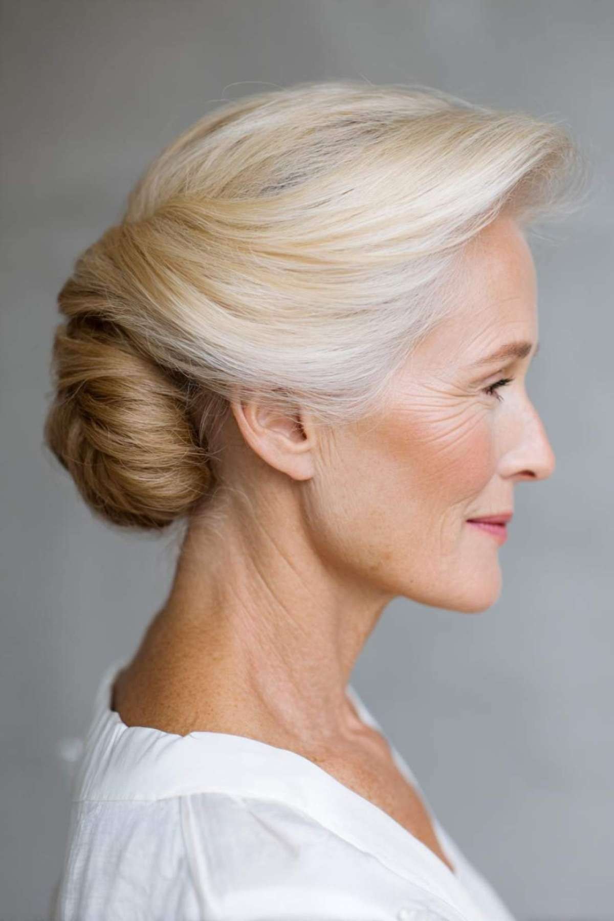 Woman over 70 with easy Gibson Tuck — easy updo for long hair inspiration for women over 70