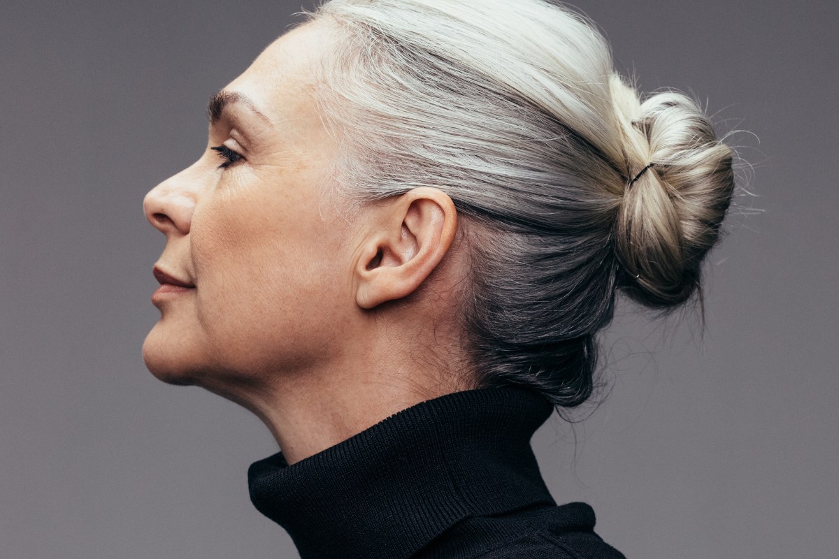 Woman over 70 with mini Rolled Nape Tuck — easy short-hair updo inspiration for women over 70
