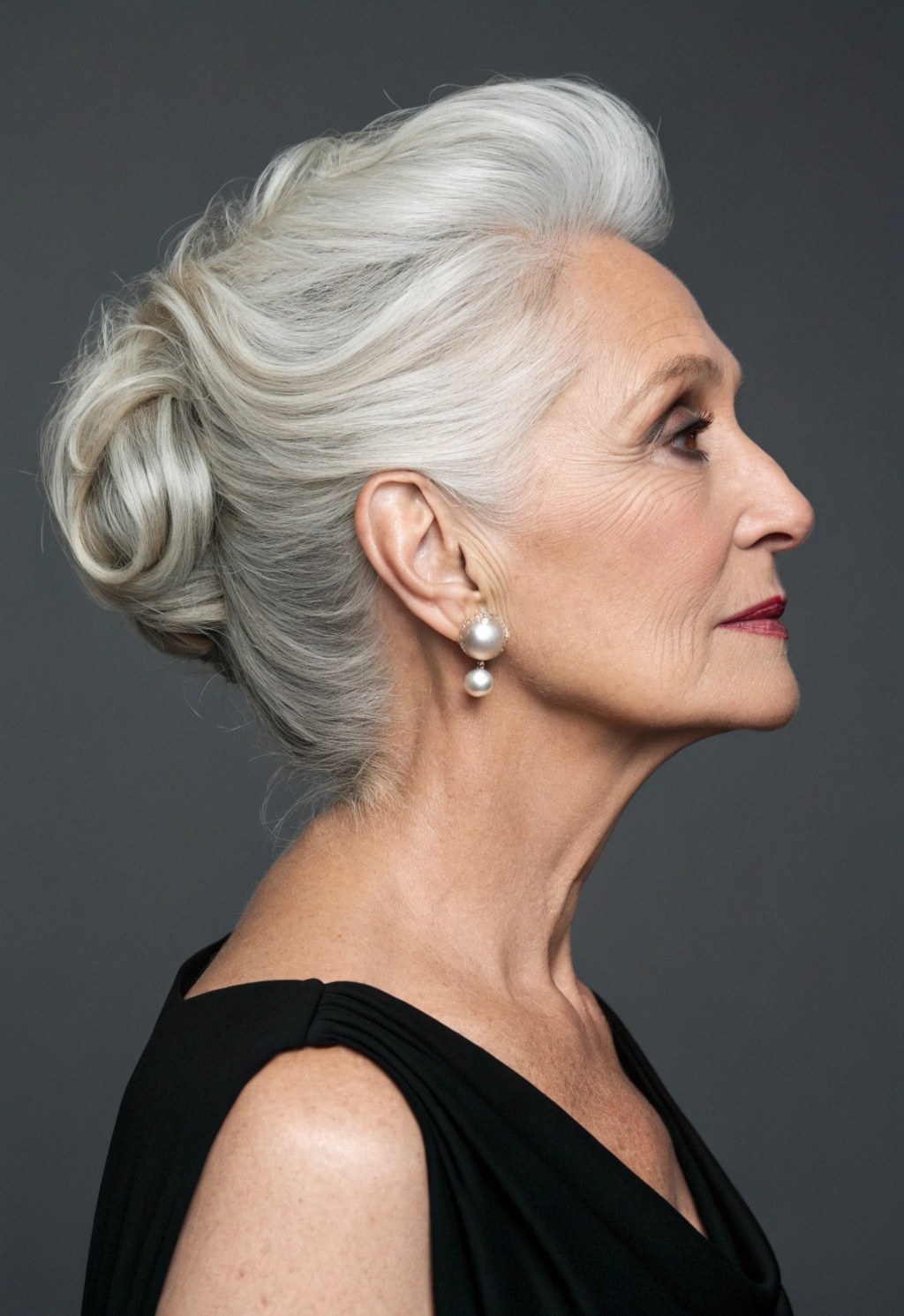 Woman over 70 with soft High Crown Bun — elegant wedding hairstyle for grandmothers over 70 inspiration for women over 70