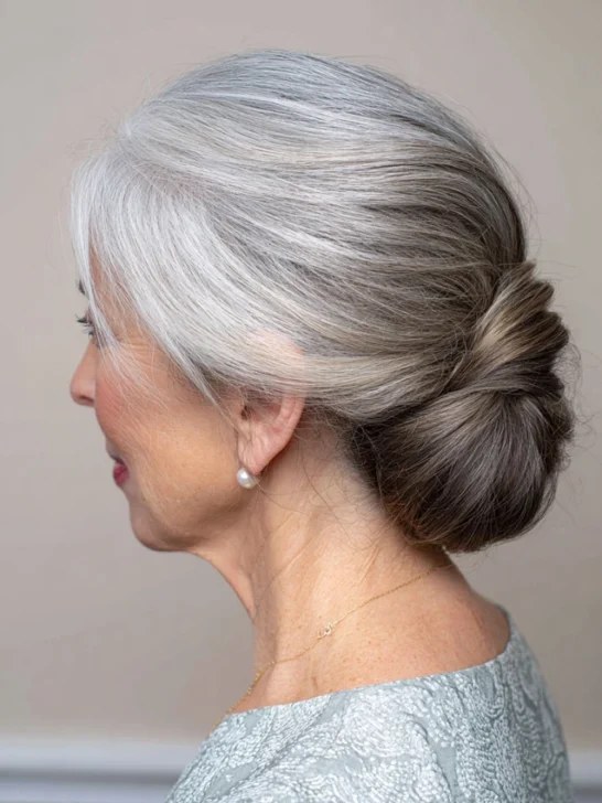 Woman over 70 with polished Nape Roll — elegant wedding hairstyle for grandmothers over 70 inspiration for women over 70