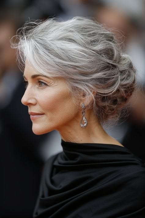 Woman over 70 with pinned-Up Curls With a Soft Fringe — elegant wedding hairstyle for grandmothers over 70 inspiration for women over 70