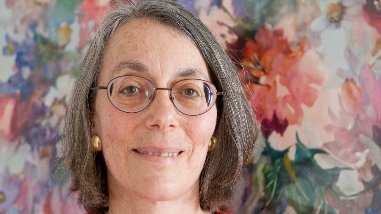 Gray shoulder length haircut on a woman over 70 with silver hair - Pearl Gray Wavy Shoulder Cut