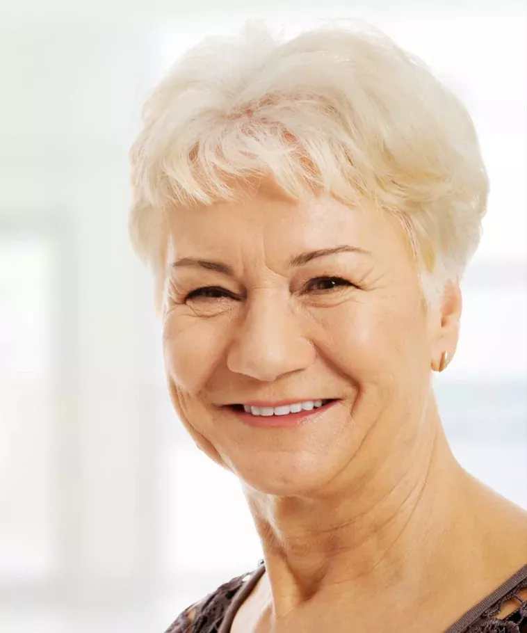 Keeping Colour: A Cream Blonde Crop That Smiles Back — woman over 70 comparing going gray versus keeping hair color