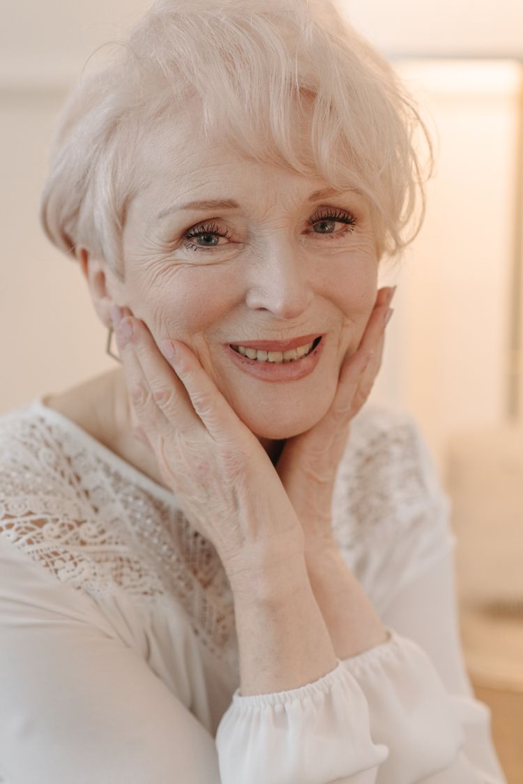 Going Gray: A Soft White Pixie That Needs Nothing — woman over 70 comparing going gray versus keeping hair color