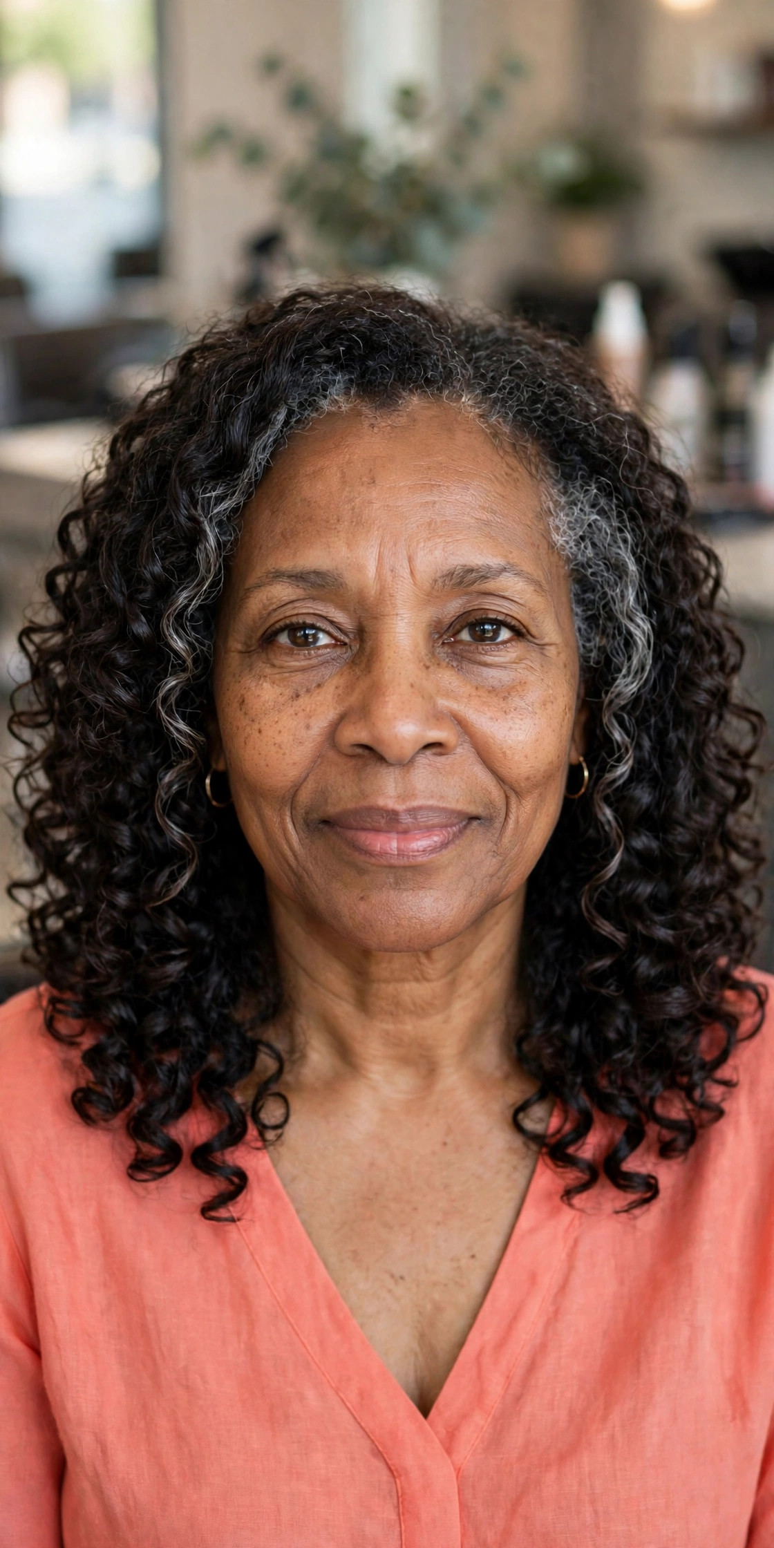 Natural Curls at Shoulder Length — woman over 50 with oval face