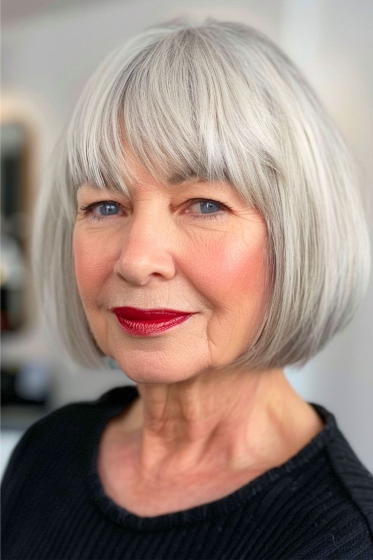Woman over 70 with smooth bob with brow-skimming bangs — flattering bangs hairstyle for women over 70