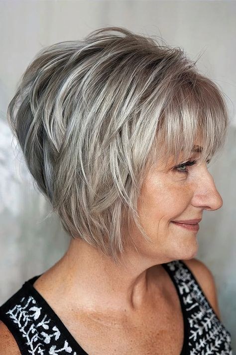 Stacked Layered Bob for a Fuller Back — layered haircut that adds volume on a woman over 70