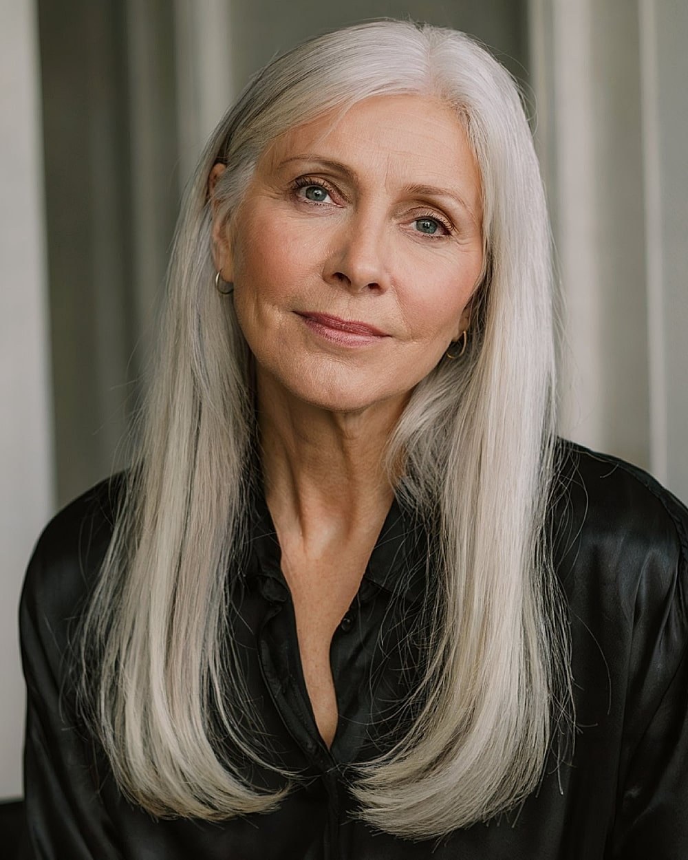 Woman over 70 with smooth Gray Length With a Deep Side Part — long gray hairstyle inspiration for women over 70