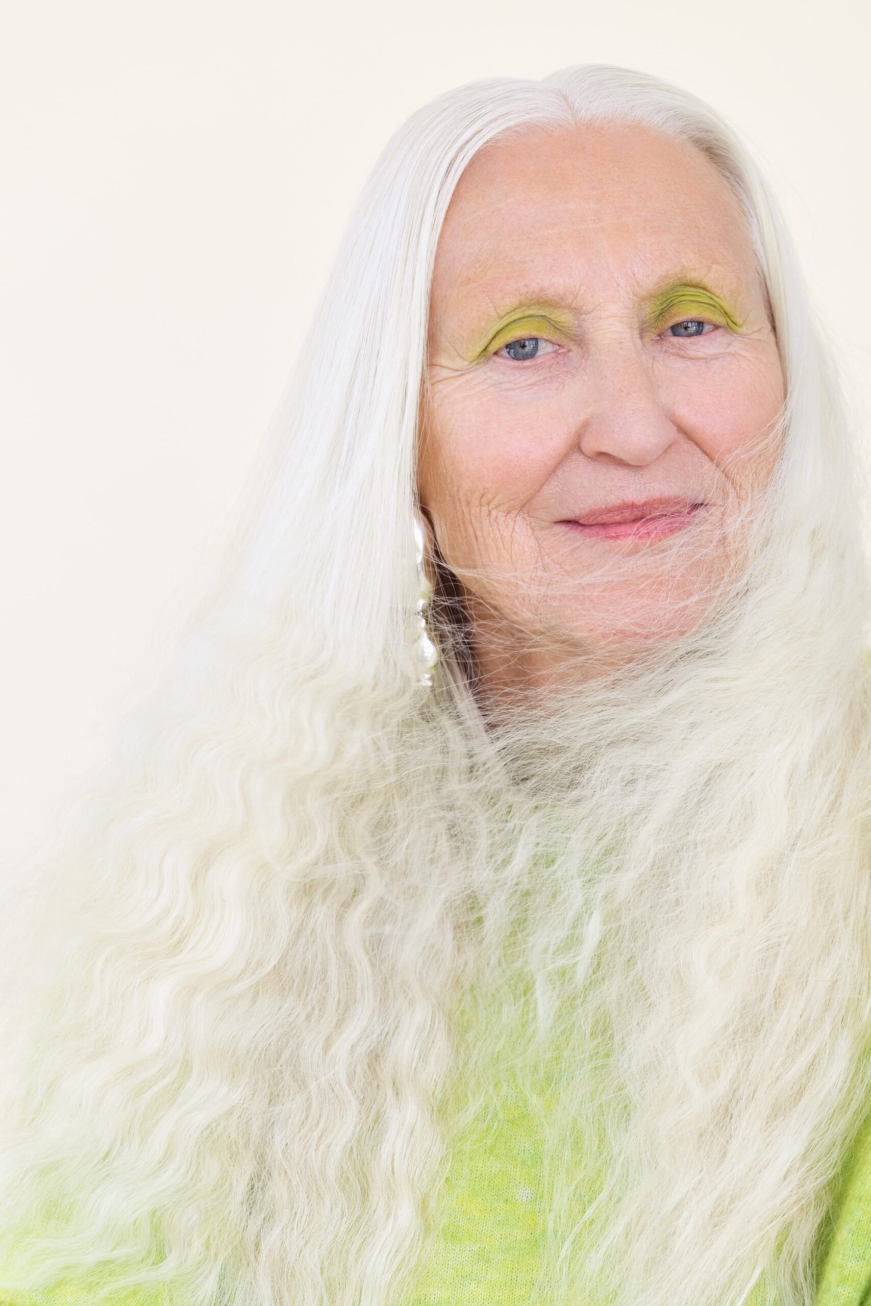 Woman over 70 with long White Waves With Natural Volume — long gray hairstyle inspiration for women over 70