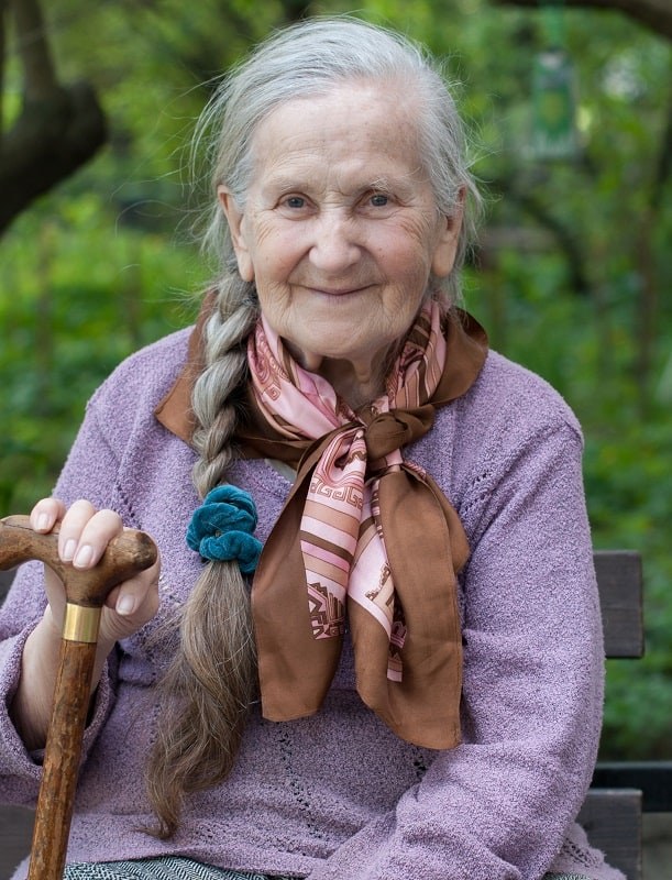 Woman over 70 with a Side Braid Over Flowing Length — long hairstyle inspiration for women over 70