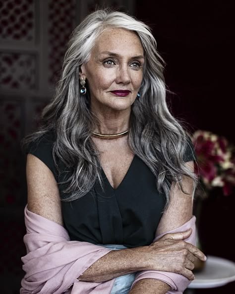 Woman over 70 with side-Swept Waves for an Evening Look — long hairstyle inspiration for women over 70
