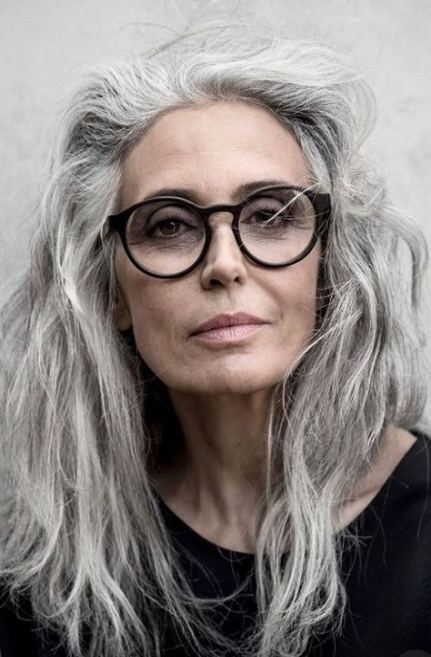 Woman over 70 with voluminous Blowout With Lift at the Crown — long hairstyle inspiration for women over 70