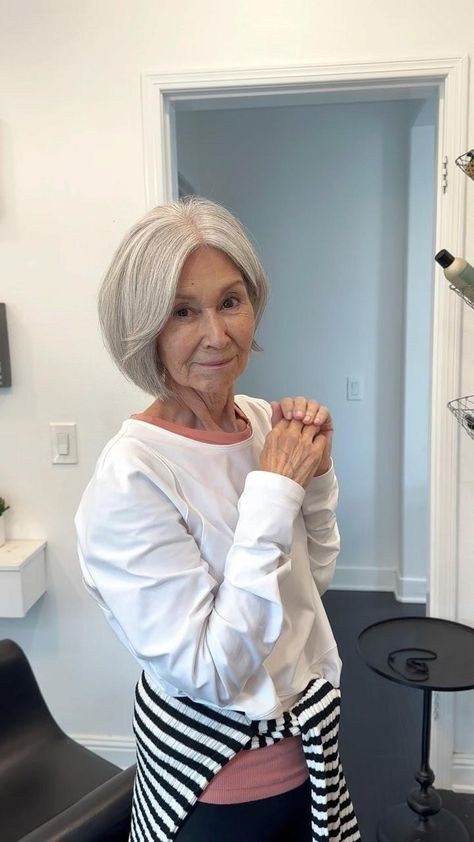 Woman over 70 with natural gray bob with soft movement — easy-care hairstyle for women over 70