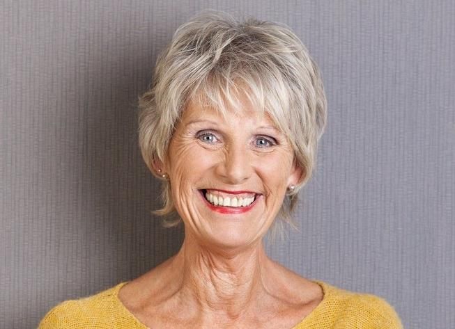 Silver-Gray Pixie With Natural Shadow — lowlights for gray hair on a woman over 70 adding depth while hair stays mostly silver