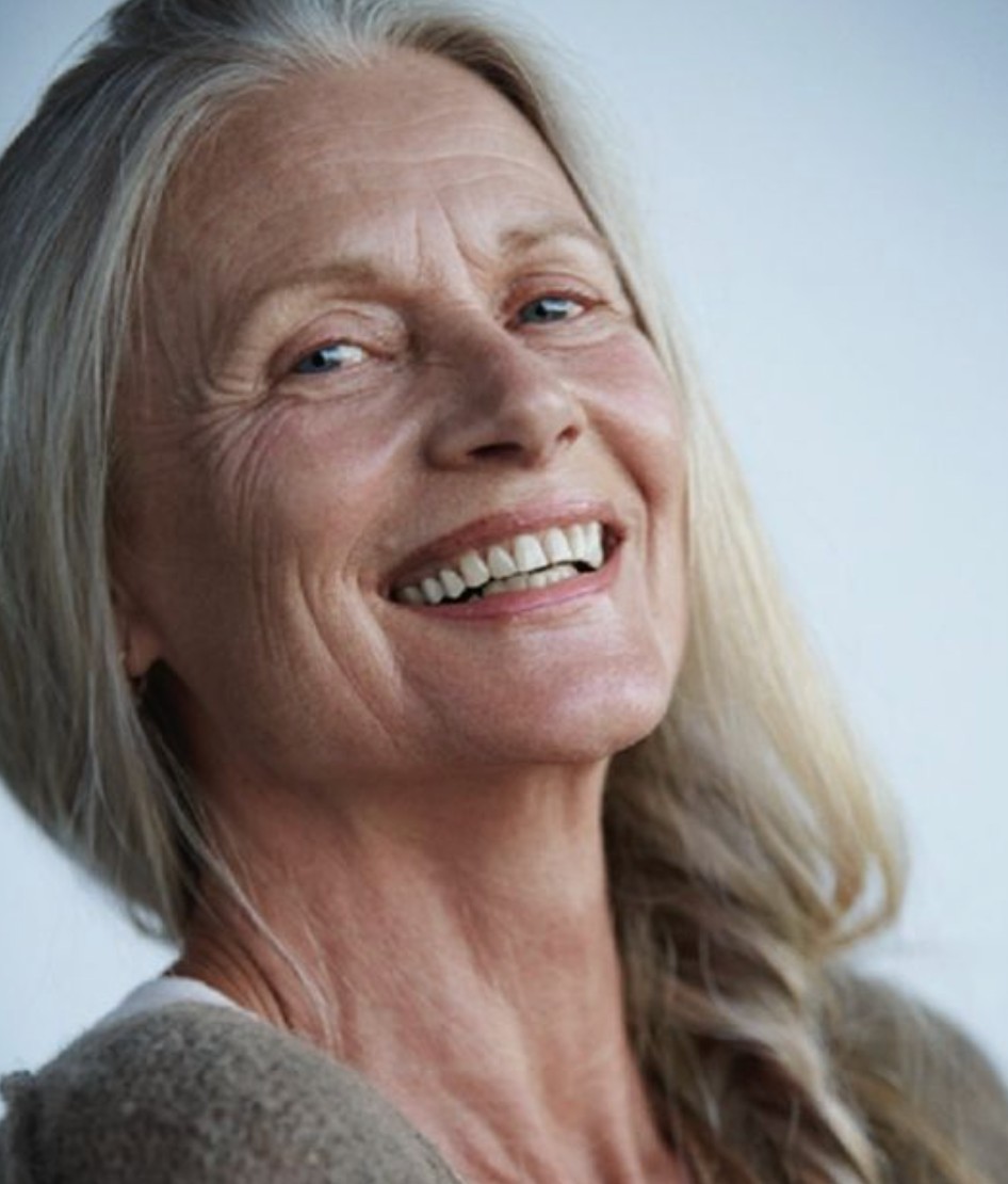 Medium layered haircut for thick hair on a woman over 70 with full dense hair - Rich, Dense Medium Cut With Graceful Flow