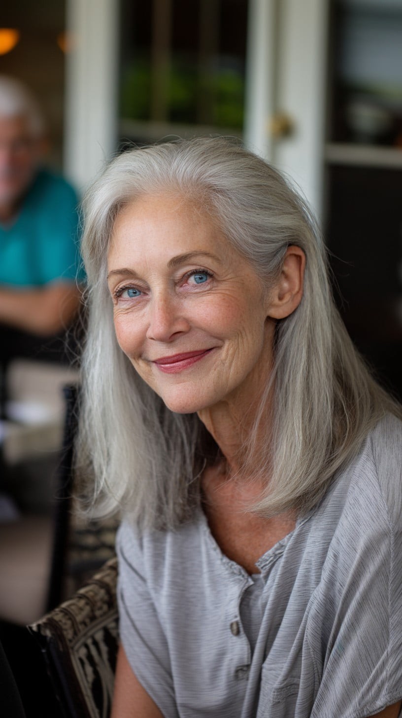 Medium length hairstyle on a woman over 70 with graceful layers - Shoulder Cut With Subtle Highlights of Movement