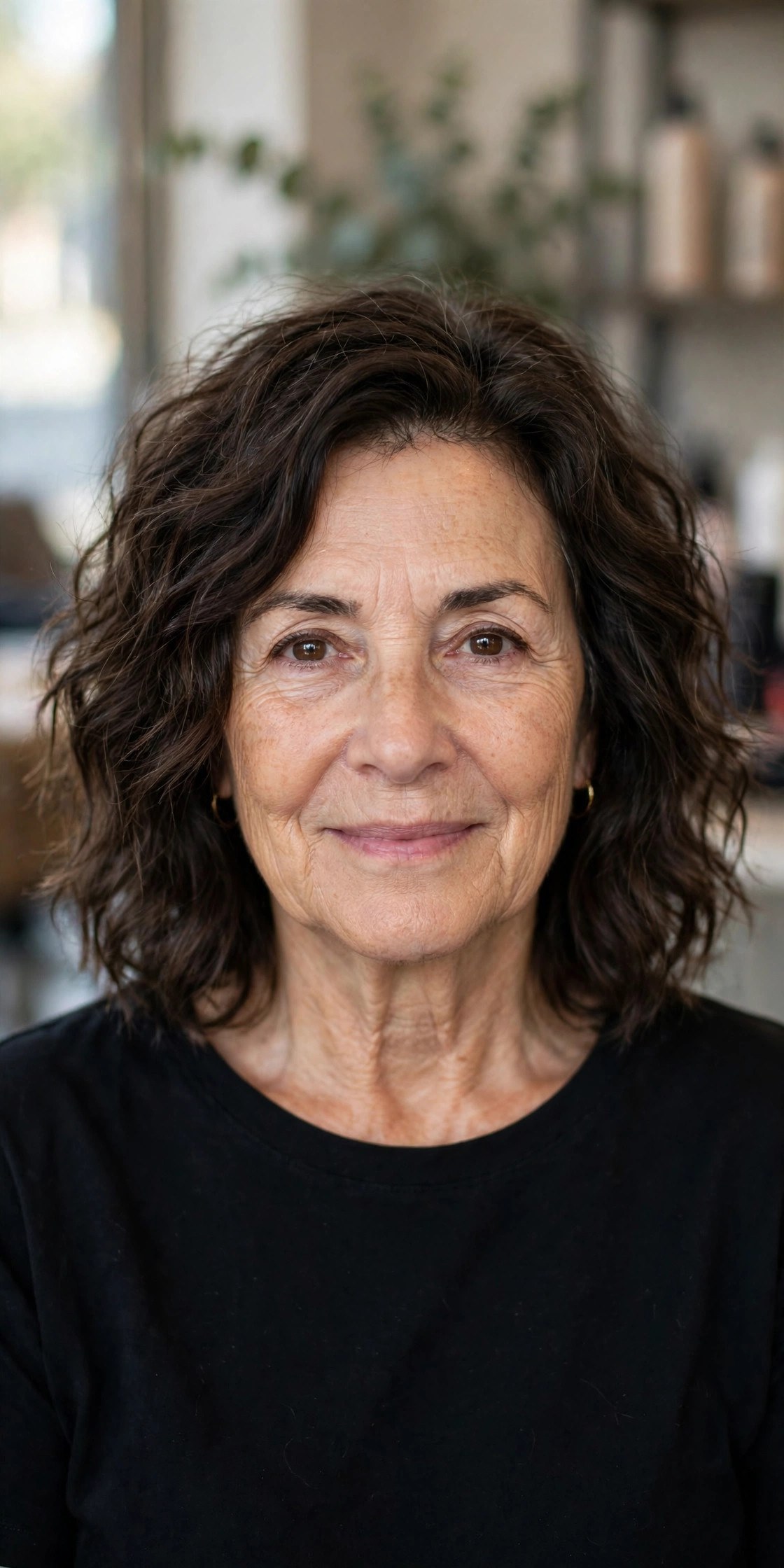Textured Wavy Shoulder Cut - medium wavy haircut on a woman over 50