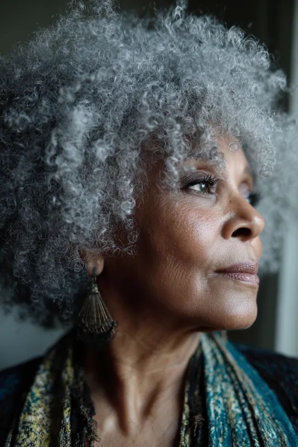 The Sculpted Silver Afro in Profile — natural hairstyle on a Black woman over 70