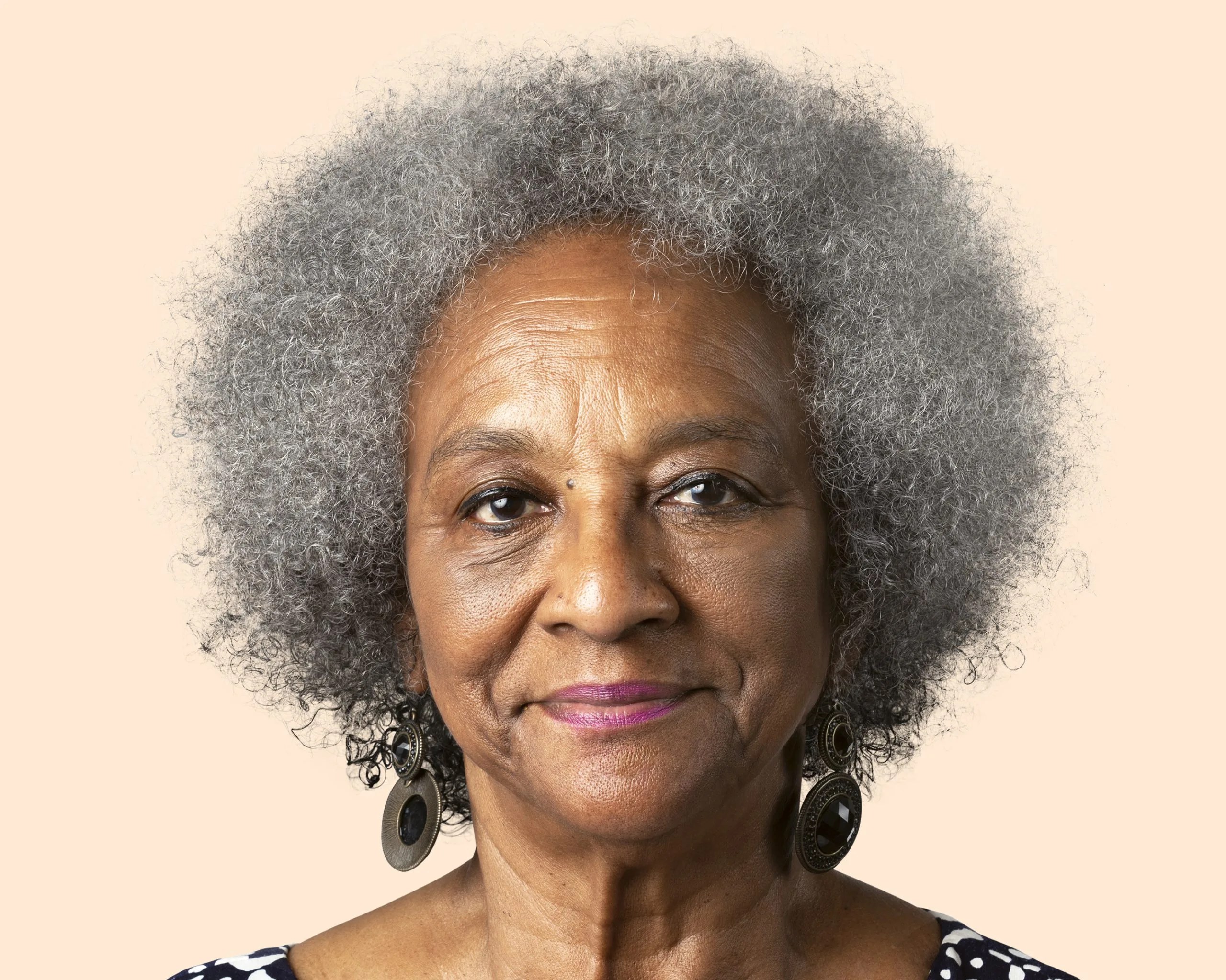 The Full Gray Afro, Front and Proud — natural hairstyle on a Black woman over 70