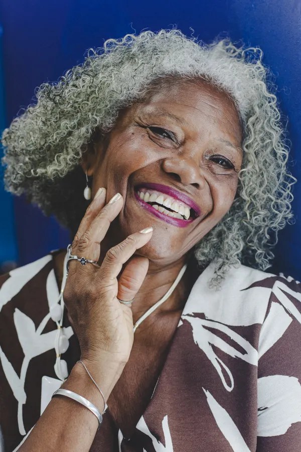 Long Gray Curls and a Joyful Laugh — natural hairstyle on a Black woman over 70