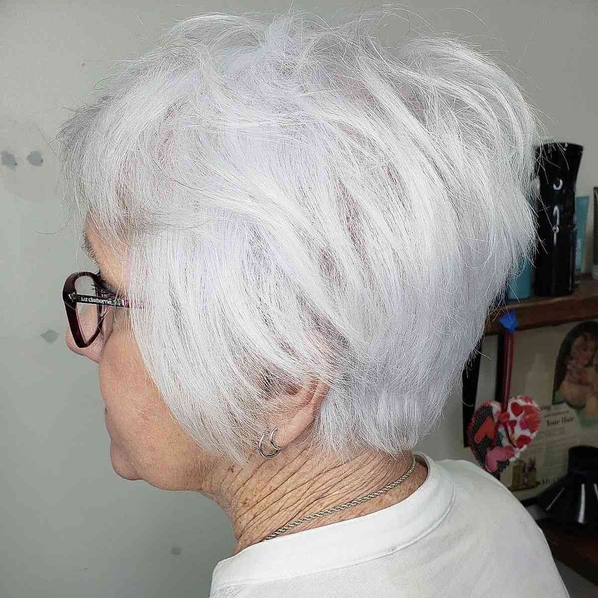 Layered White Crop With a Feathered Nape — short hairstyle for coarse gray hair on a woman over 70