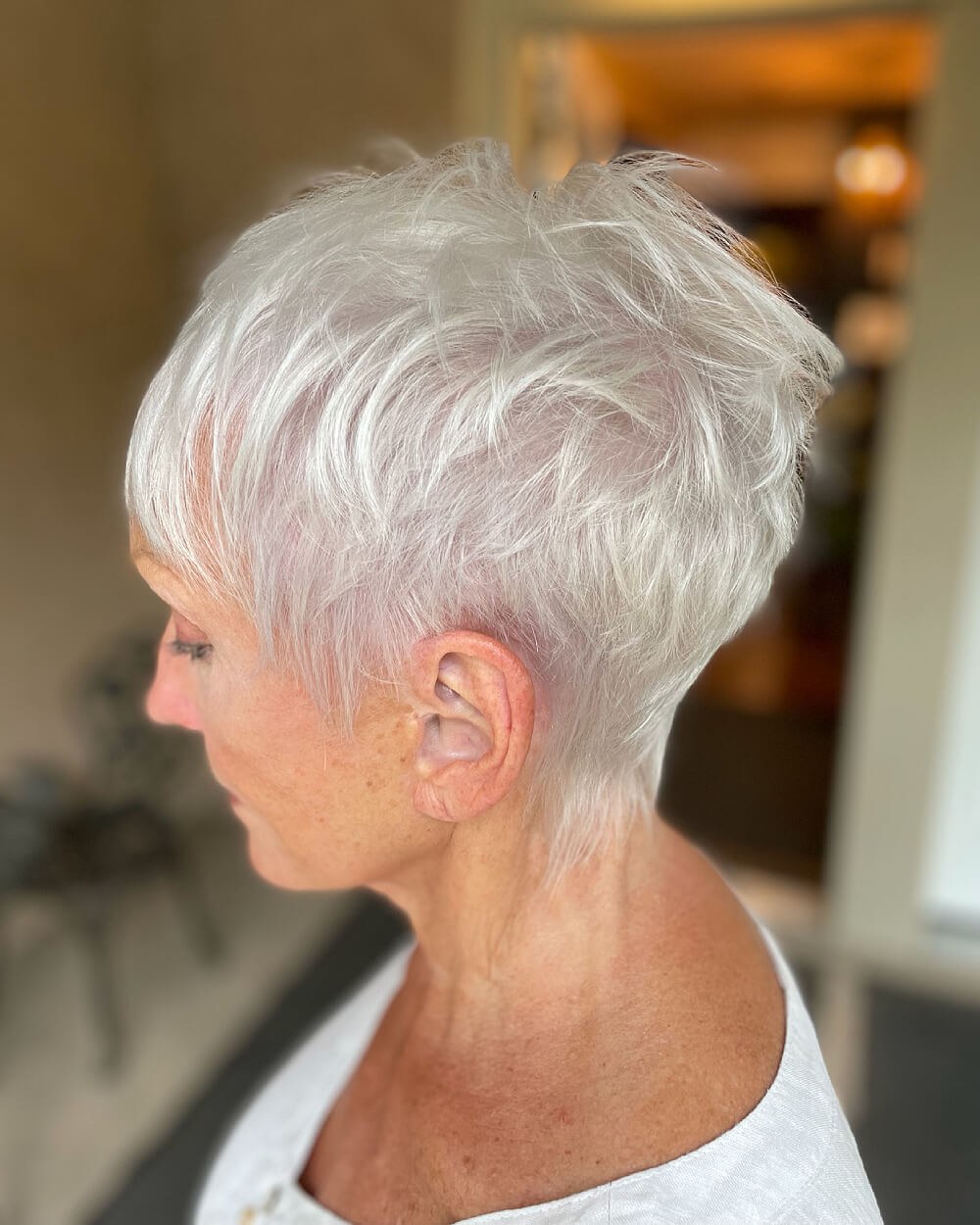 The Tapered White Pixie, Neat at the Nape — short hairstyle for coarse gray hair on a woman over 70