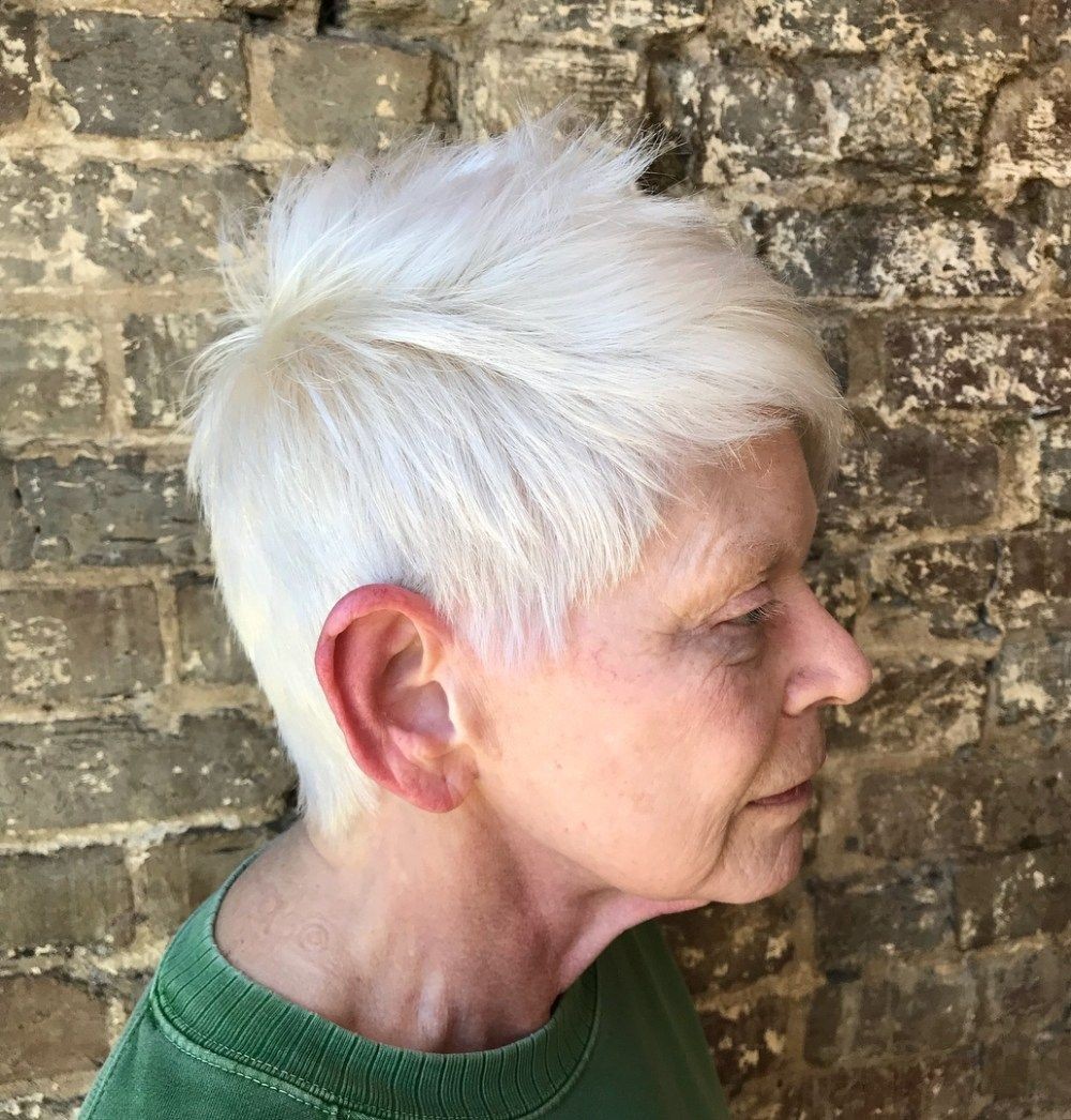Woman over 70 with a wash-and-wear white crop — short easy haircut for women over 70