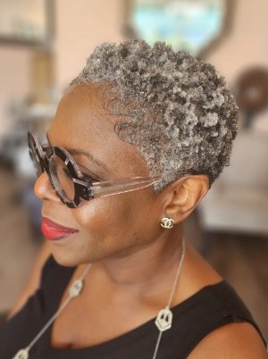 Short Gray Finger Waves With Sunglasses — short gray natural haircut on a Black woman over 70