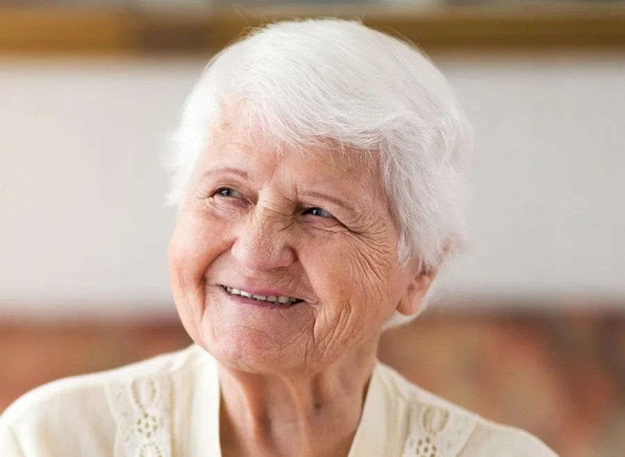 The Rounded White Bob, Short and Sweet — short haircut on a woman over 70 with a soft jawline