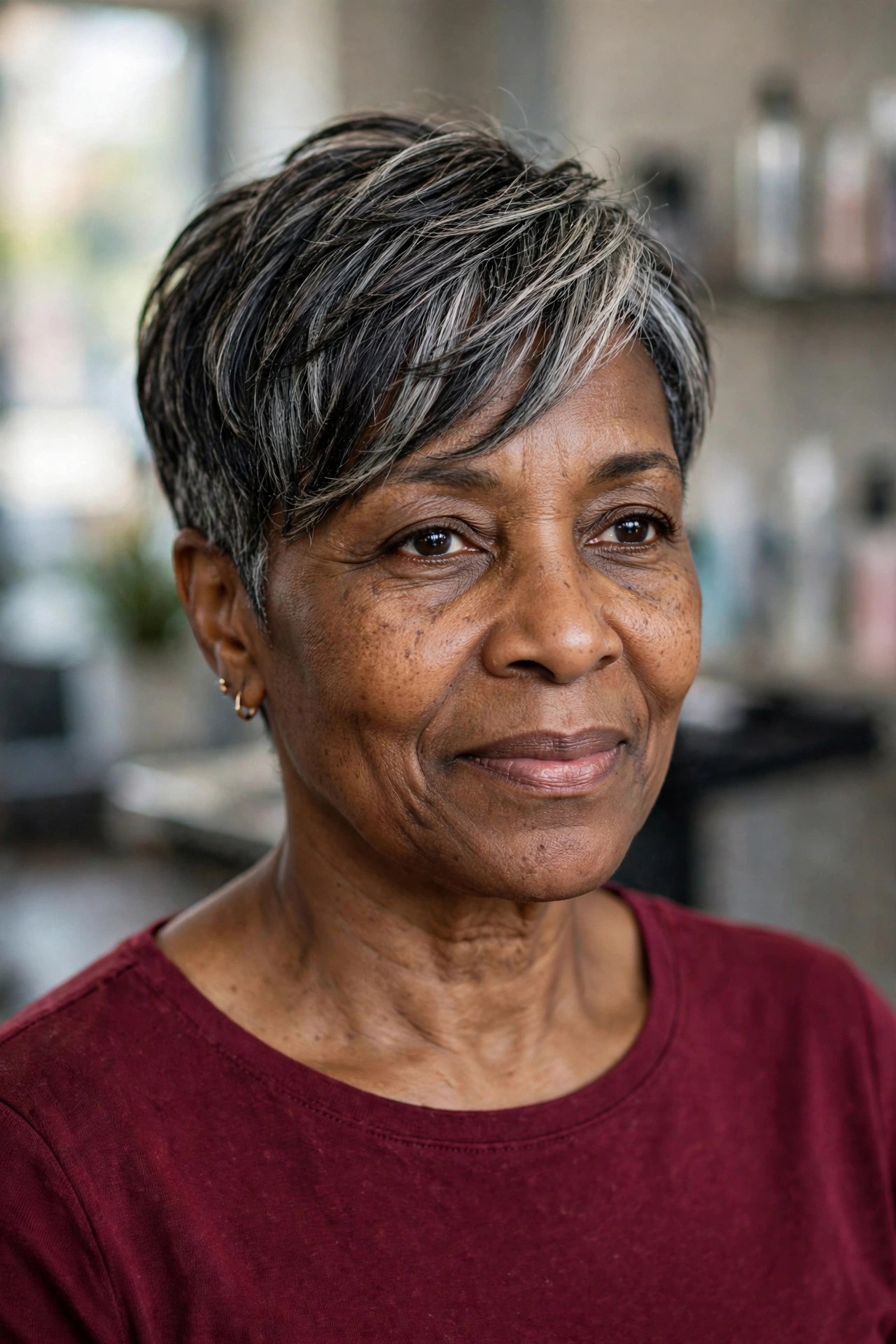 Side-Swept Salt-and-Pepper Pixie - short gray haircut for Black woman over 50