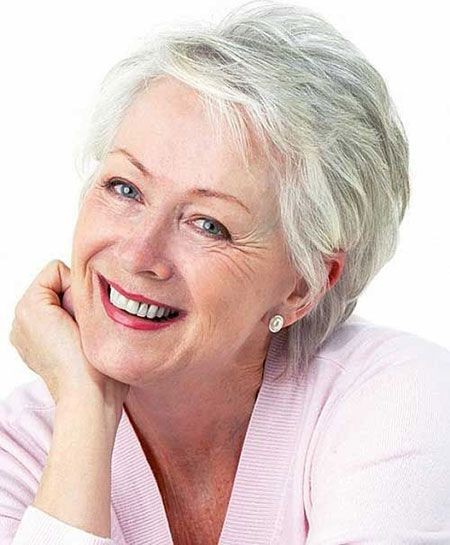 Woman over 70 with a full silver crop with a lifted crown — short hairstyle for women over 70