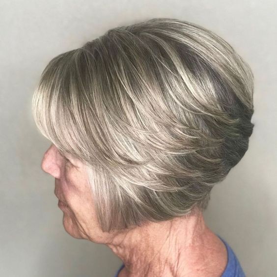 Woman over 70 with a smooth layered bob — side and back view — short layered haircut back view for women over 70