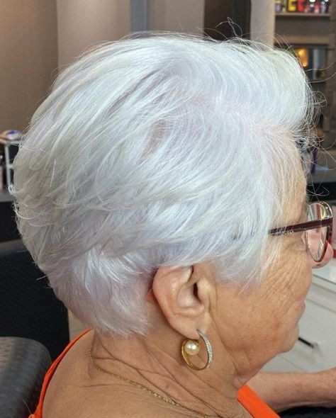 Woman over 70 with a snow-white rounded crop — profile and back — short layered haircut back view for women over 70