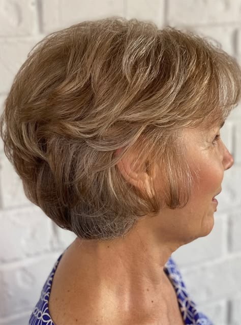 Woman over 70 with a feathered blonde layers — profile and back — short layered haircut back view for women over 70