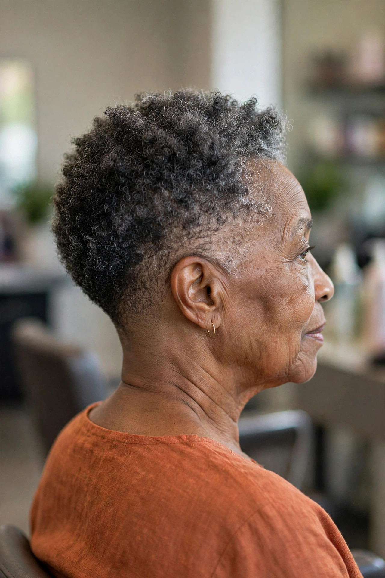 Clean Tapered Nape (The Back View) - short tapered natural haircut on a Black woman over 60
