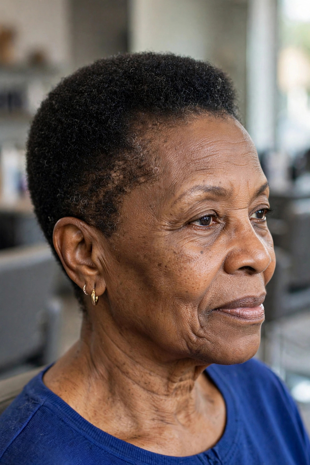 Fresh Shape-Up Taper with a Natural Hairline - short tapered natural haircut on a Black woman over 60