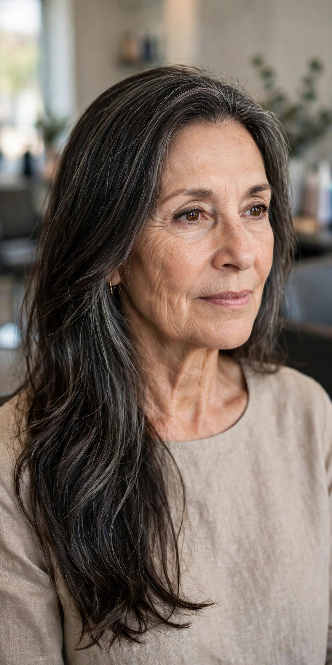 Smoky Brunette Silver Blend on Long Hair - silver blending hair idea for woman over 50 with early grays