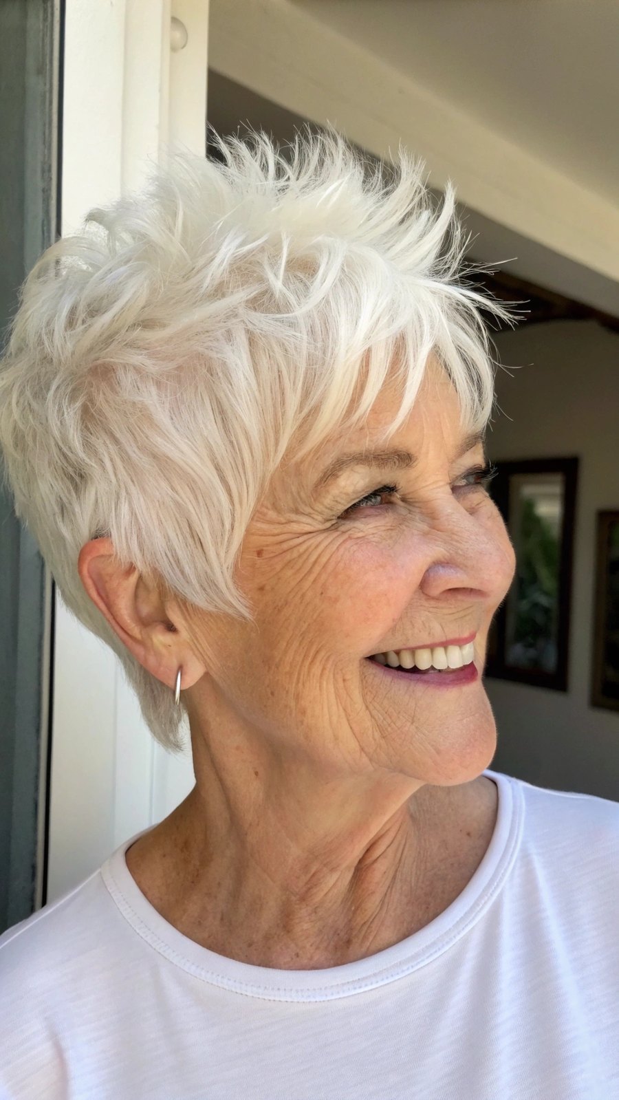 The Silver Spiky Pixie in Profile - silver short hairstyle on a woman over 70