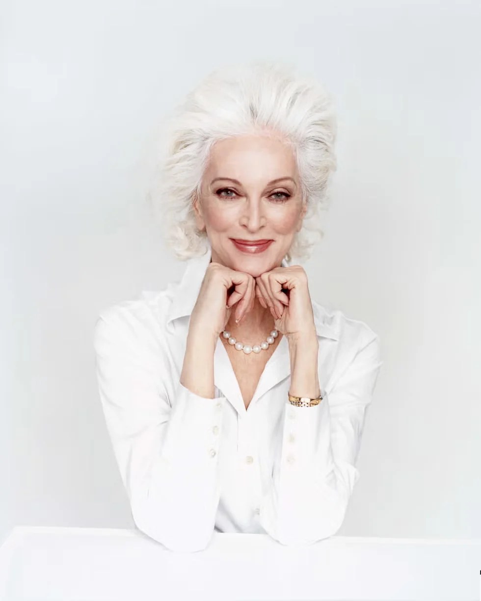 Wavy Rounded Bob with Natural Movement — soft rounded bob hairstyle on a woman over 70 with gray hair