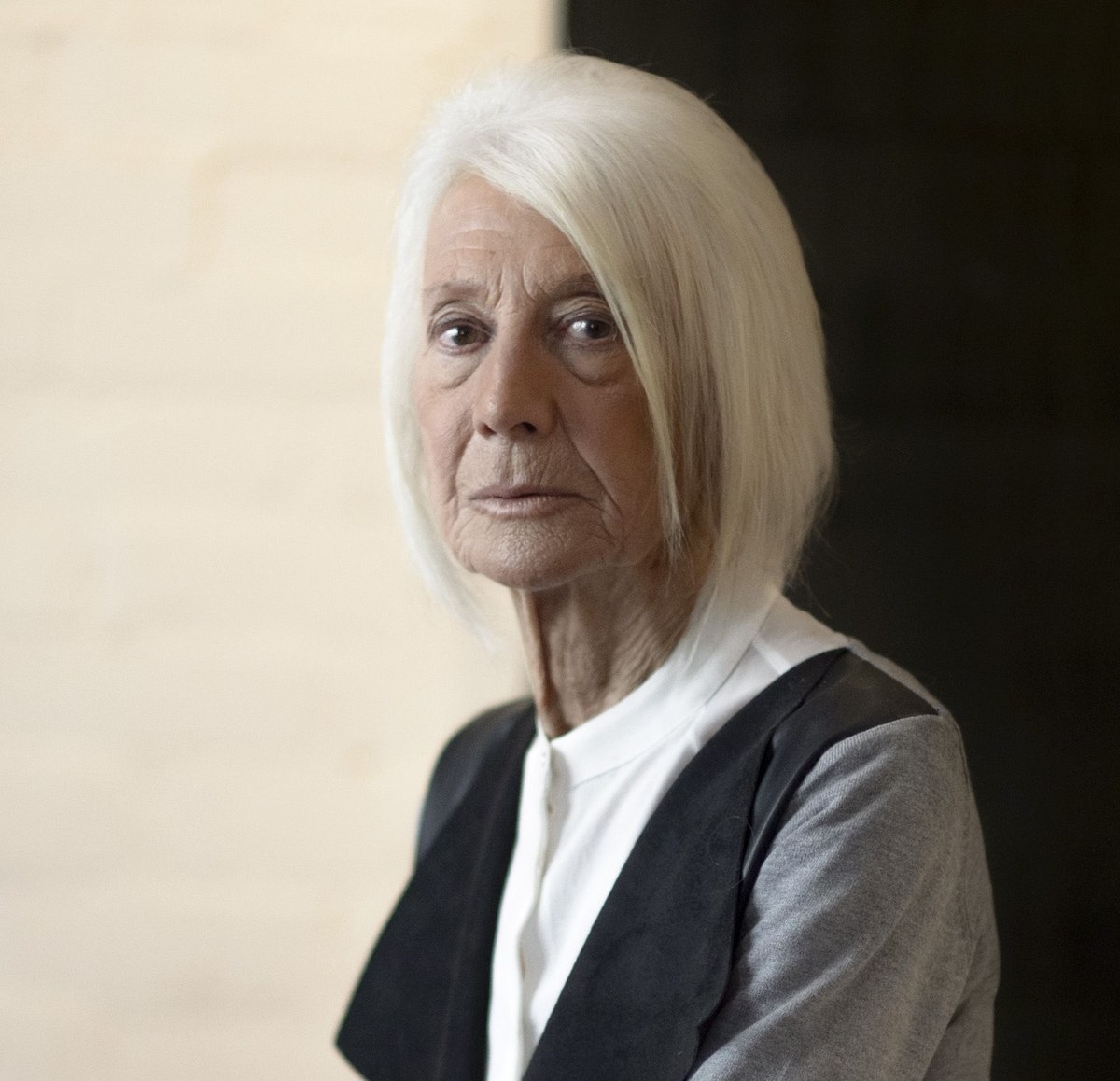 Smooth Rounded Bob for Straight Hair — soft rounded bob hairstyle on a woman over 70 with gray hair