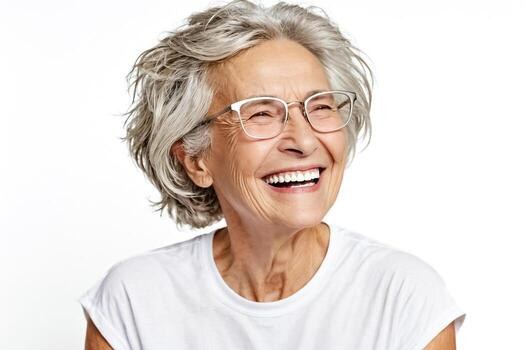 Rounded Bob for Hearing-Aid Comfort — soft rounded bob hairstyle on a woman over 70 with gray hair