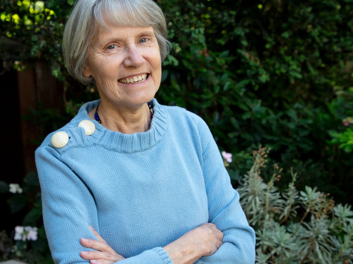 Plump Rounded Bob with Crown Fullness — soft rounded bob hairstyle on a woman over 70 with gray hair