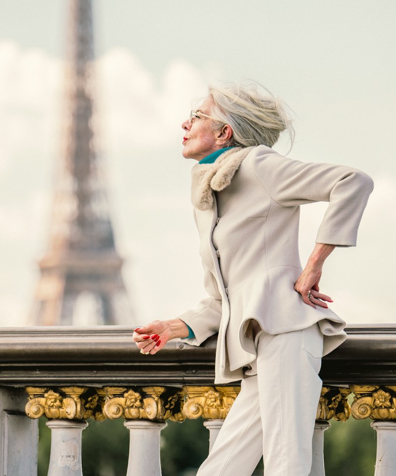 Parisian White Suit With a Windswept Crop — stylish haircut on a fashion-loving woman over 70