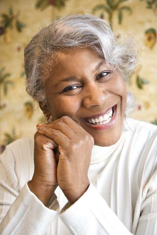 Silver Waves With a Cream Knit — stylish haircut on a fashion-loving woman over 70