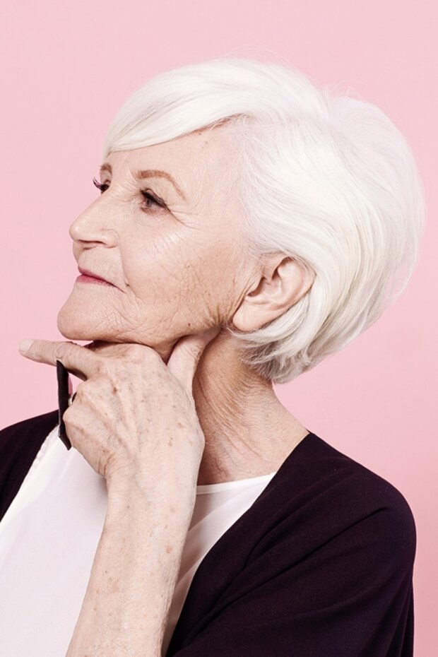 Woman over 70 with pink-Backdrop Bob with a Clean Line — summer short haircut for women over 70